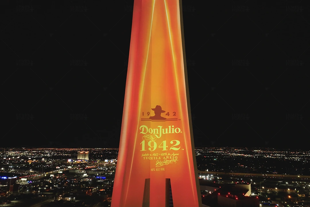 Don Julio 1942 bottle artwork projected onto the Stratosphere tower