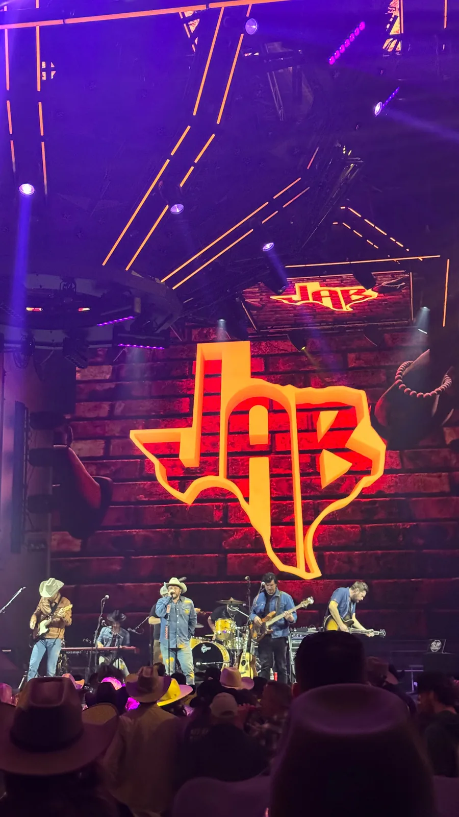 Josh Abbott Band performing at Zouk with JAB logo visuals and ceiling lighting