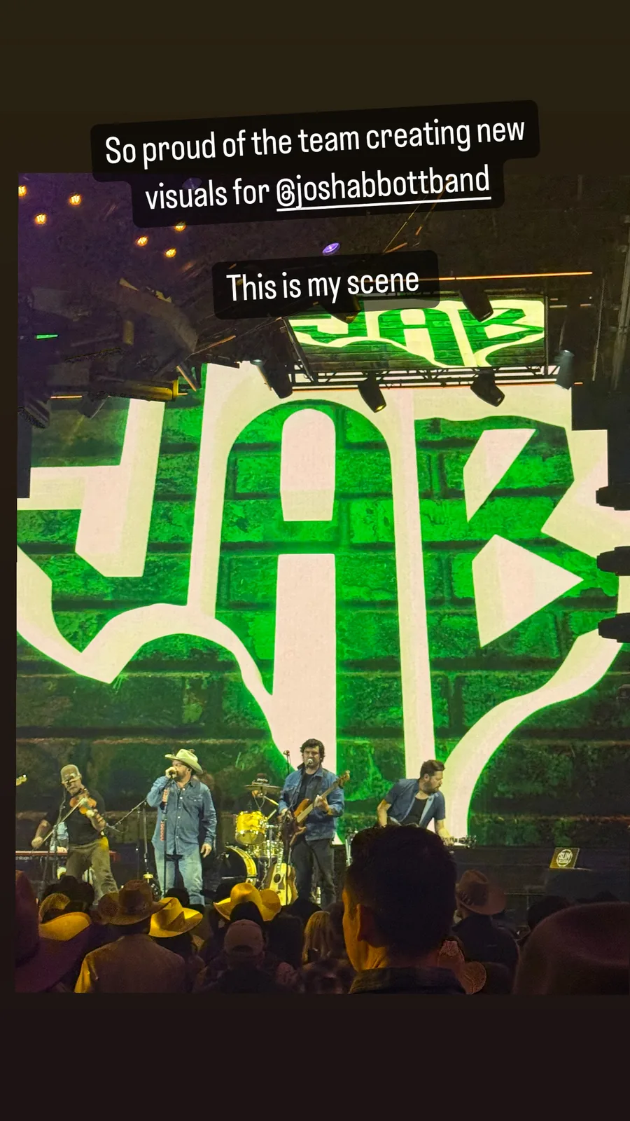 Josh Abbott Band on stage with large green JAB logo visuals
