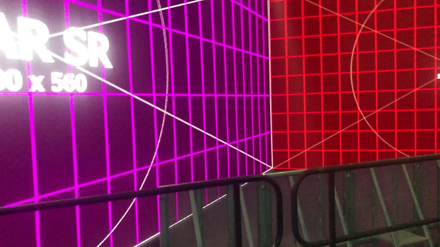 Magenta and red LED wall corner with rear screen label