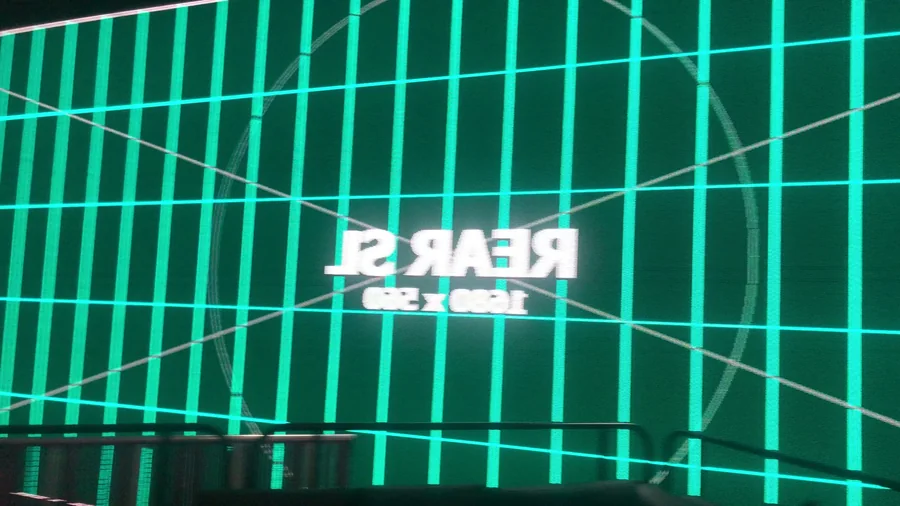 Teal LED wall calibration grid labeled rear screen