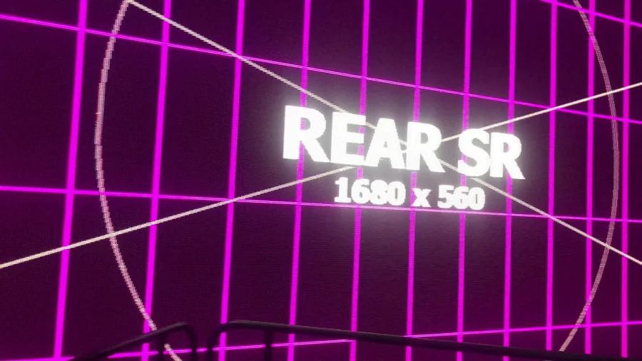 Corner of magenta and red LED wall calibration grids inside The Pentagon