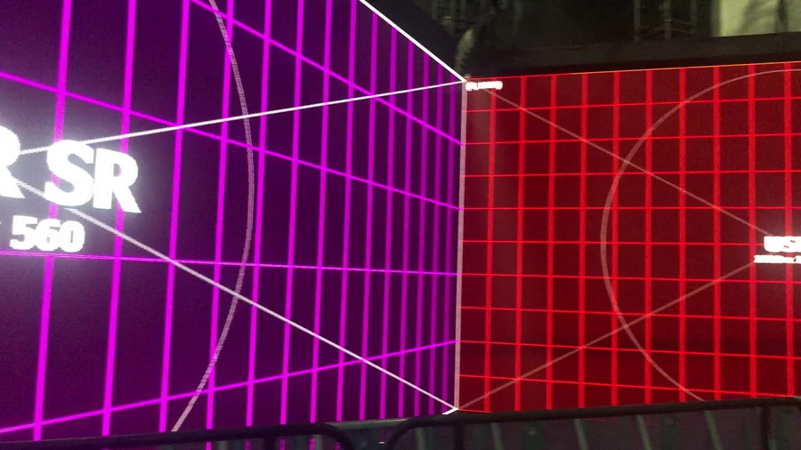 Red and green LED wall mapping surfaces with overhead fixtures