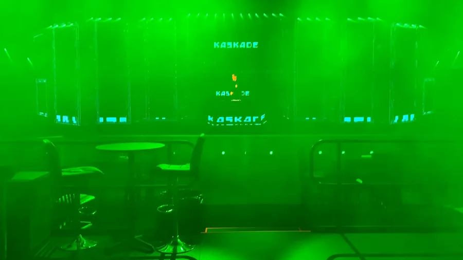 Green laser and haze pass across the animated virtual stage