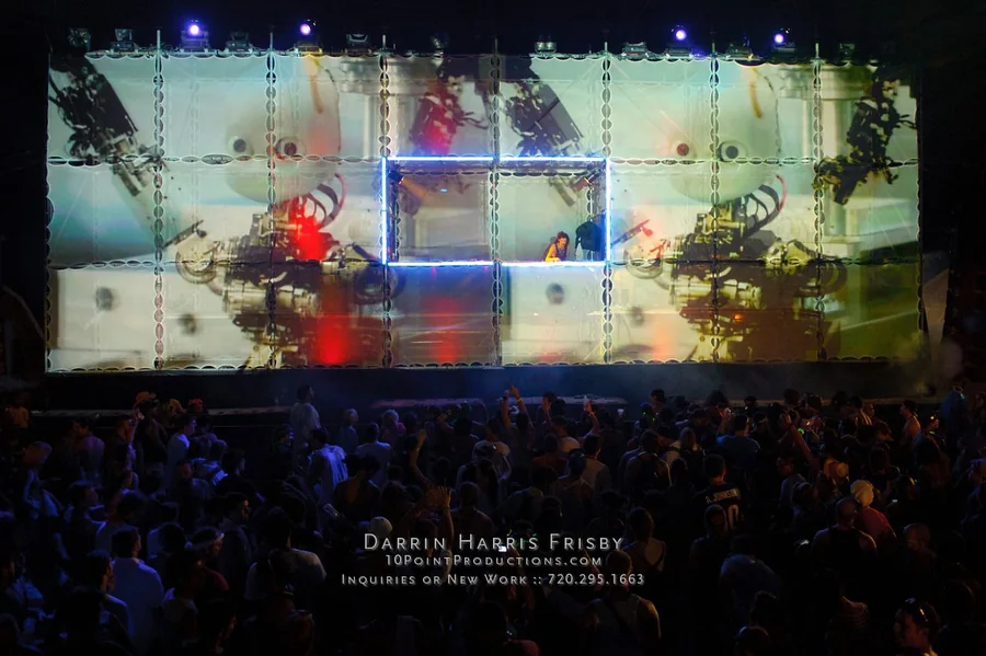 Crowd facing the Root Society Tower of Babel during a live visual set