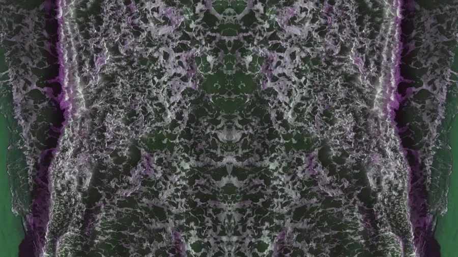 Vertical mirrored coastline still from the second water movie deliverable