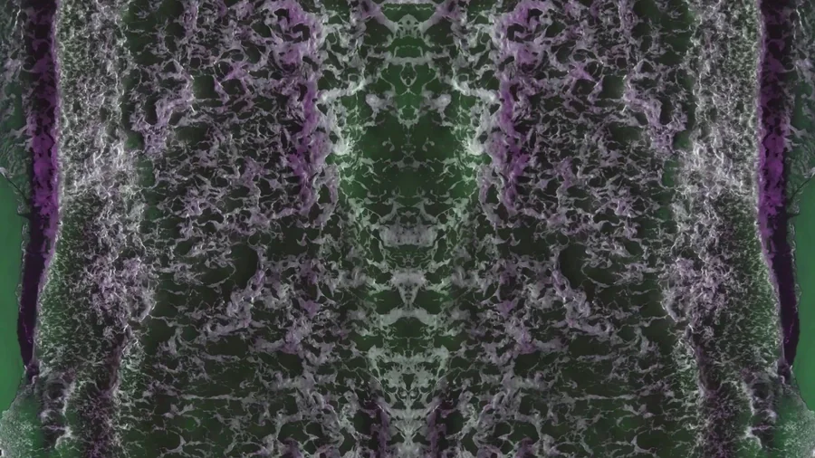 Mirrored green and violet water wall still from the fourth water movie deliverable