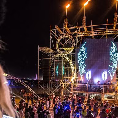 Apex Camp Burning Man 2013 visual wall and flame towers from MELT Instagram archive