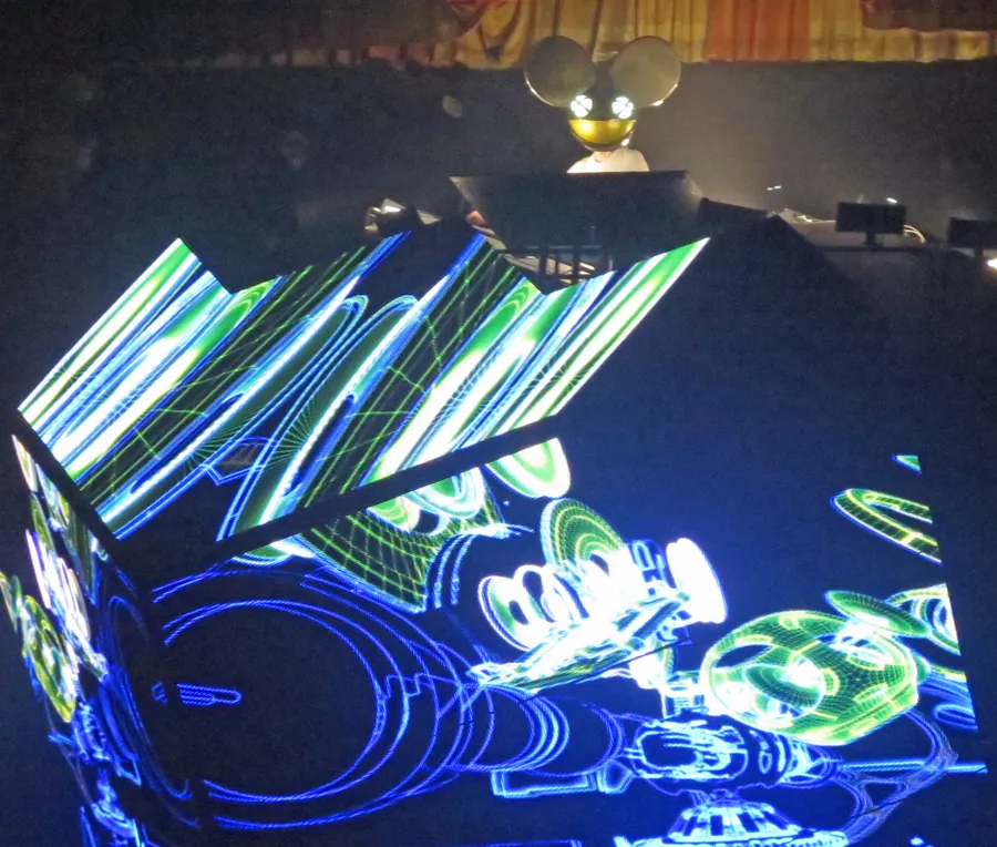 Wide Cube 2.1 stage environment with green and blue animated graphics