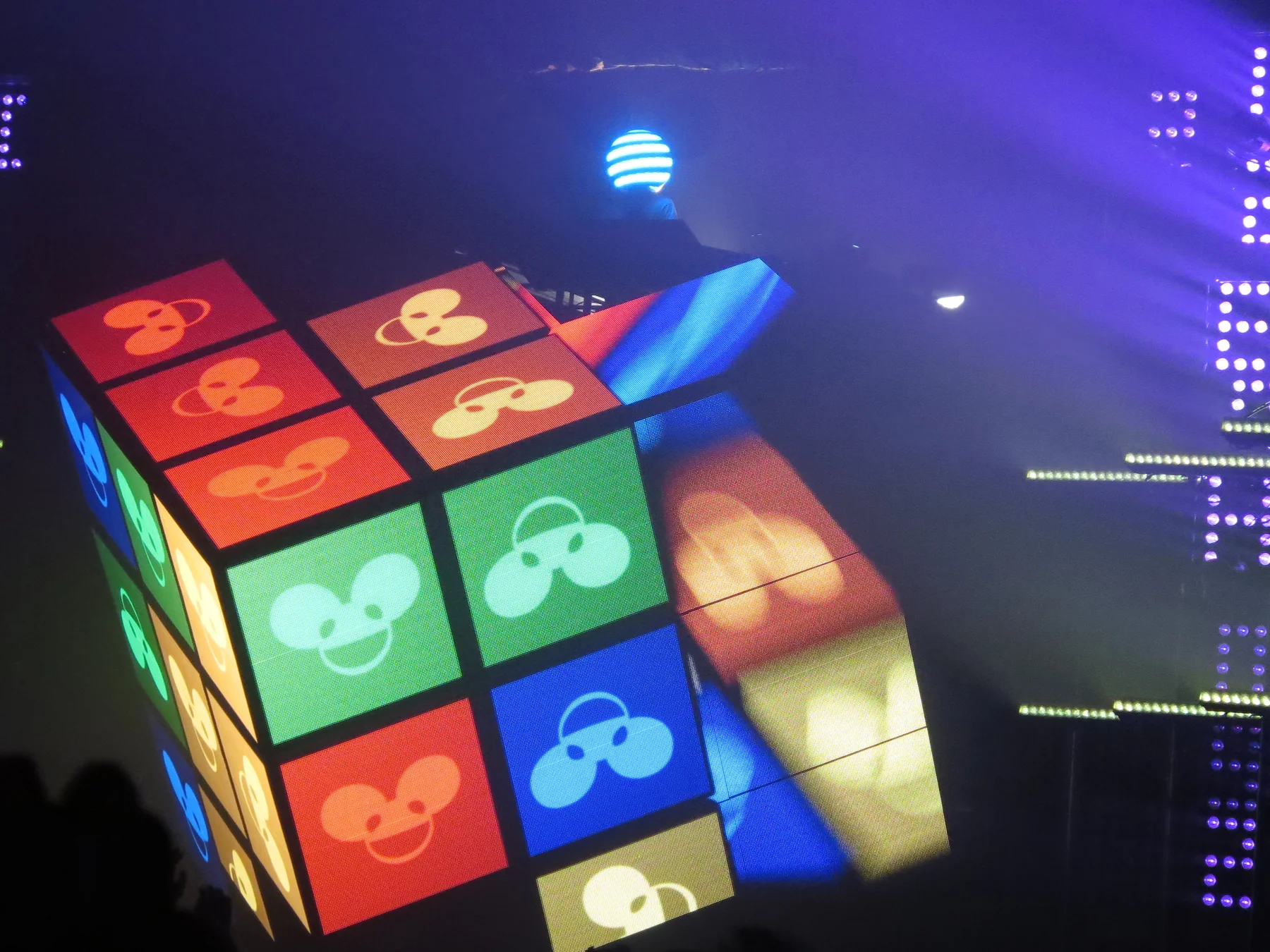 deadmau5 Cube 2.1 illuminated with a colorful grid during the Lots of Shows in a Row tour